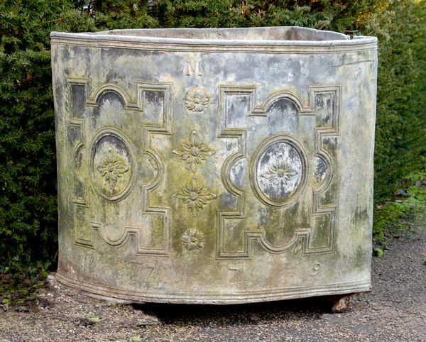 A rare Georgian lead corner cistern with initial M and dated 1779 92cm high by 120cm wide