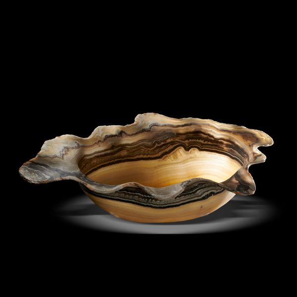 A large banded onyx bowl Mexico 82cm wide by 49cm deep