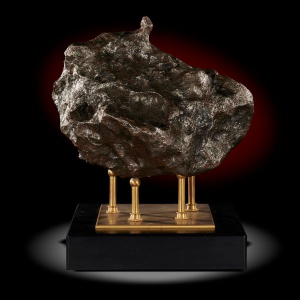 A Campo del Cielo meteorite on metal stand  the specimen 30cm high, 36kg From an old collection from Uruguay formed in the 1970‘s, then in an...
