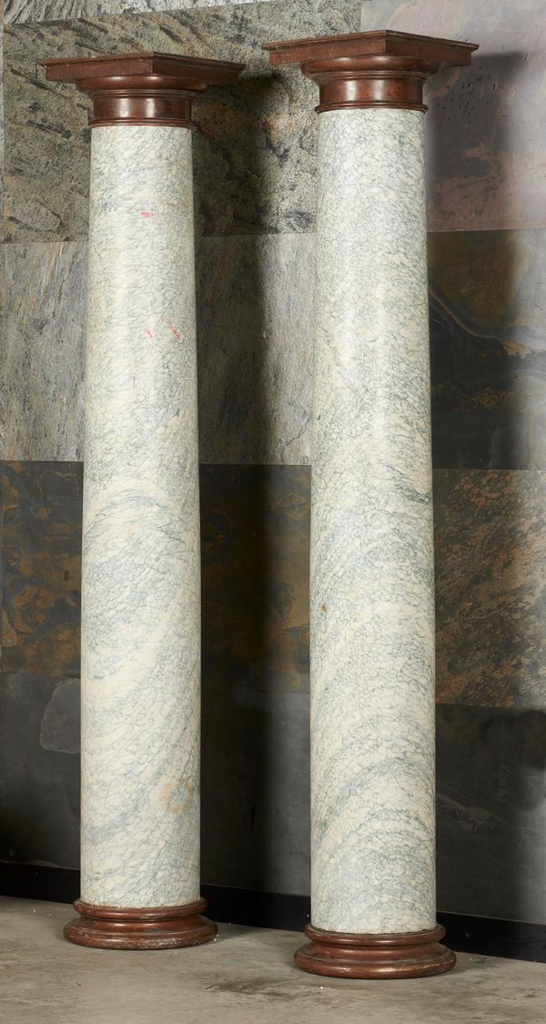 A pair of Cipollino marble columns 19th century with bronze caps and bases 216cm high by 38cm diameter