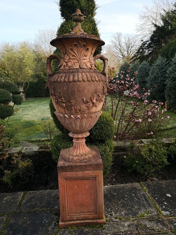 A Swedish style composition stone finial on pedestal 2nd half 20th century 218cm high Provenance: From a private garden in Totteridge, North London