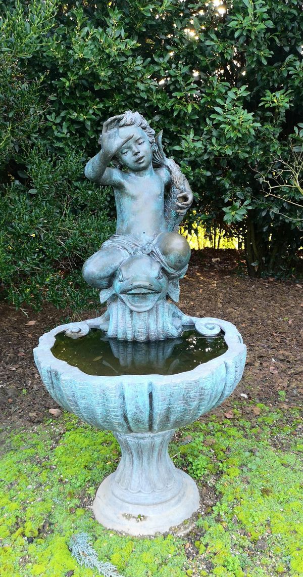 A bronze fountain 2nd half 20th century with dolphin mouth drilled for water, 135cm high Provenance: From a private garden in Totteridge, North...