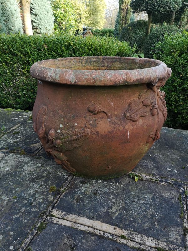 A hand thrown terracotta planter 2nd half 20th century 54cm high by 68cm diameter Provenance: From a private garden in Totteridge, North London