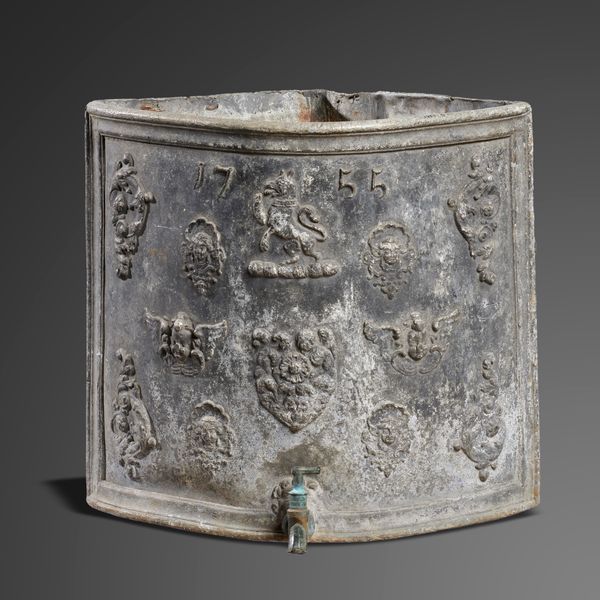 A small Georgian lead corner cistern dated 1755 and with bronze tap 52cm high by 55cm wide It is extremely rare to find lead cisterns of such modest...