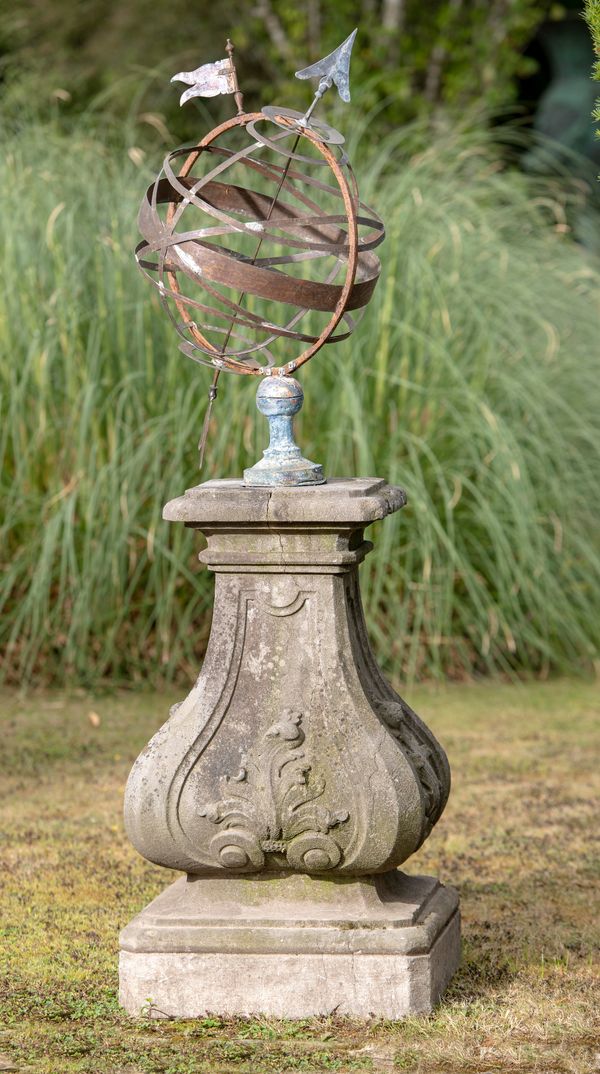 A rare and early iron and copper armillary on carved stone pedestal mid 18th century 164cm high Armillary spheres which date back  to the 4th...