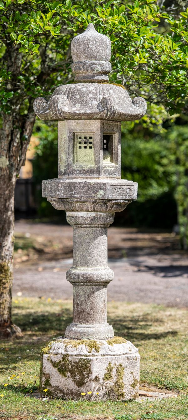 A granite kasuge lantern Japanese, Meiji Period 1868-1912 210cm high