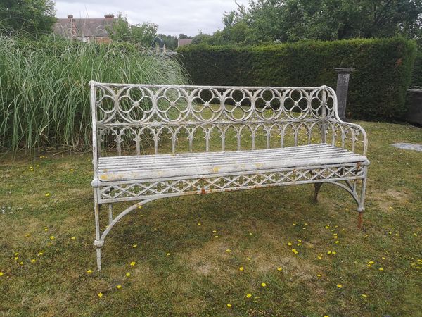 A rare Ducel foundry Gothic pattern cast iron seat circa 1870 the front apron stamped Ducel fils Rue des , Paris, Fecit, with replaced wooden...