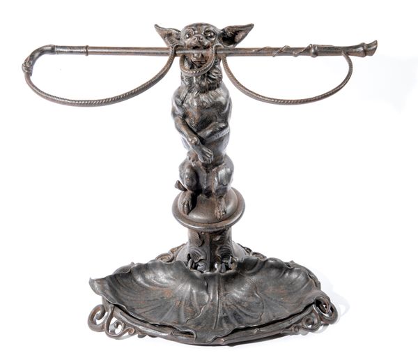 A Coalbrookdale cast iron stick stand with drip tray with diamond registration stamp and number 62cm high This model is illustrated in the 1875...