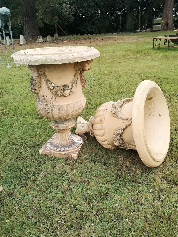 A fragmentary pair of substantial Blashfield terracotta urns circa 1870 the interior of one stamped The Stamford Terracotta company Blashfield...