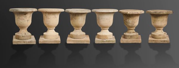 A run of six carved Cotswold stone finials 1st half 19th century Provenance: This and the following lot came from The Rocks, Marshfield,...