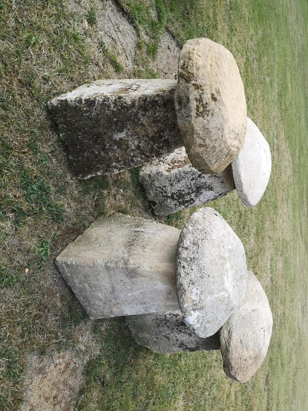 A harlequin set of four carved Cotswold stone staddlestones average height 76cm