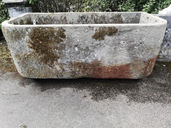 An unusually large sandstone D-shaped trough 75cm high by 214cm long by 107cm deep 