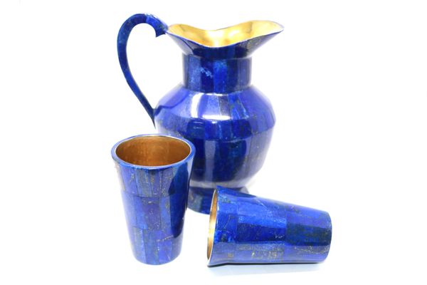A lapis lazuli water jug and cups cups 11.5cm high by 8cm wide, jug 21.5cm by 13cm wide