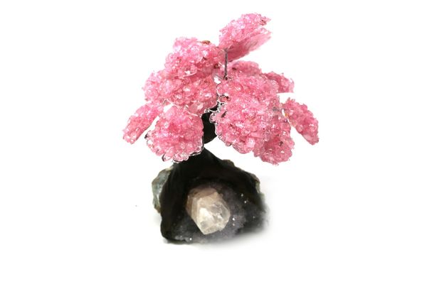 A rose quartz tree with fifteen petals on amethyst and composition base 18cm high