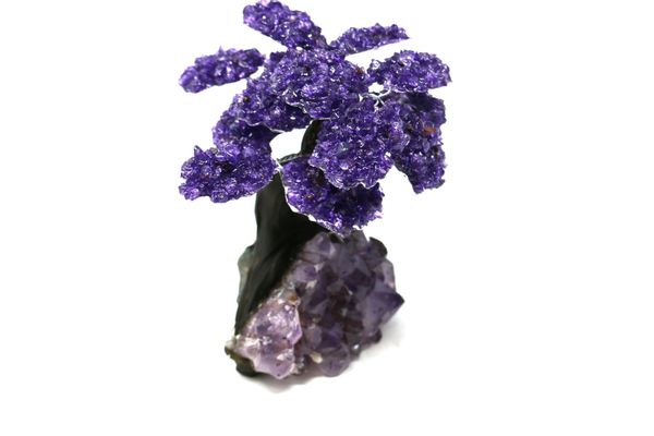 An amethyst tree with fifteen petals on composition and amethyst base 18cm high