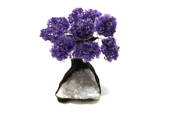 An amethyst tree with nine petals on composition and amethyst base 14cm high