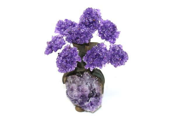 An amethyst tree with nine petals on composition and amethyst base 14cm high