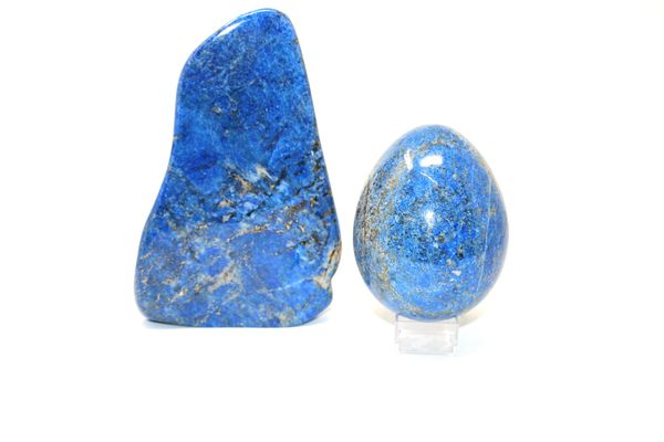 A Madani Jundak lapis lazuli freeform and egg Freeform 21.5cm high; Egg 12cm high