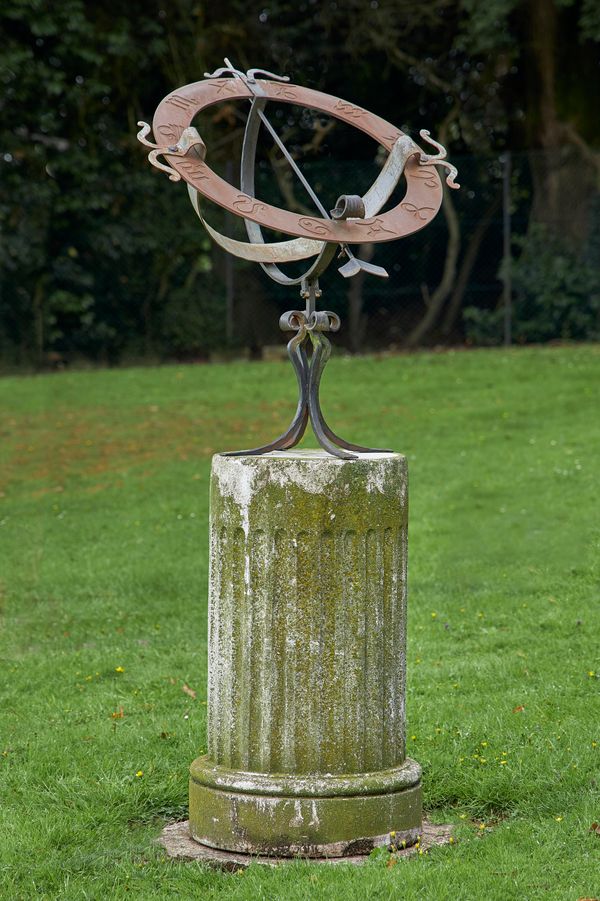 A wrought iron and copper armillary mid 20th century on fluted composition stone column pedestal 180cm high