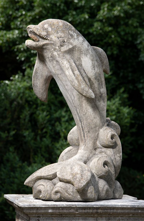 A composition stone fountain in the form of a dolphin  2nd half 20th century 120cm high
