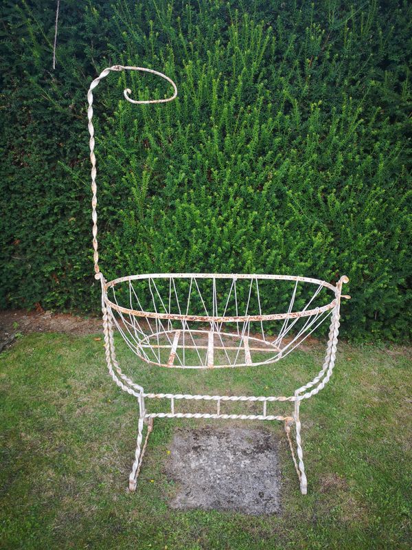 A rare Victorian estate made wrought iron cradle 2nd half 19th century 170cm high by 110cm wide