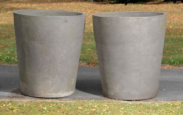A pair of Atelier Vierkant handmade clay planters modern each with maker‘s stamp each 89cm high by 79cm diameter Atelier Vierkant based in Belgium...