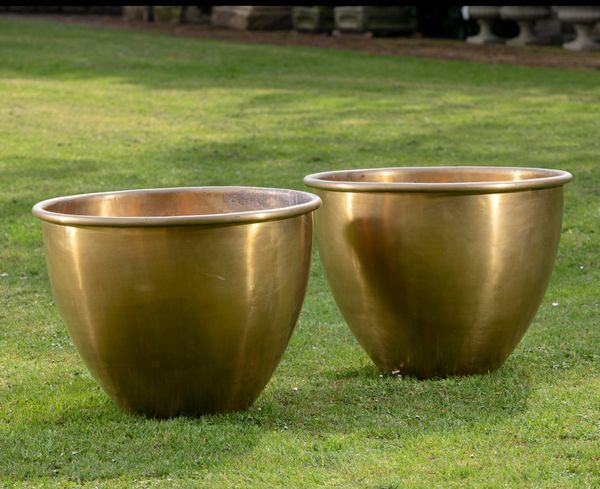 A pair of brass planters modern 60cm high by 75cm diameter