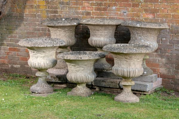 A set of four composition stone urns and two similar urns  2nd half 20th century  76cm high