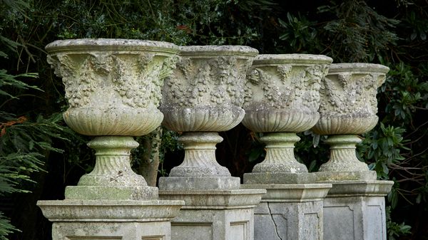 A set of four composition stone urns 2nd half 20th century 70cm high