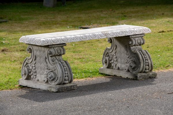 A carved marble bench on associated composition stone supports late 20th century  120cm long