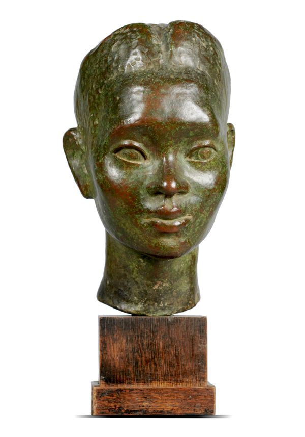 A bronze bust of a girl 2nd quarter 20th century  on oak plinth 34cm high