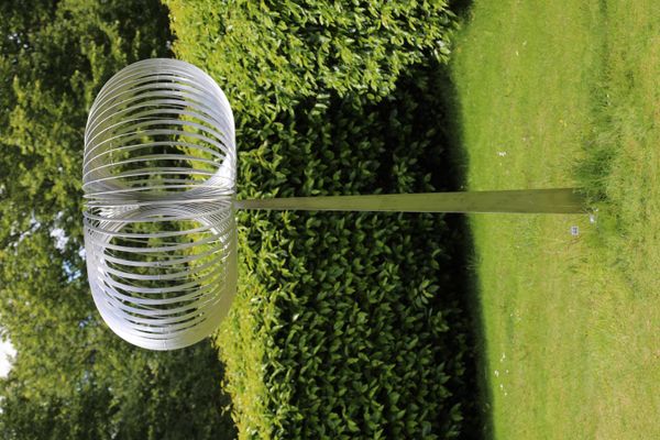 Richard Cresswell Torus Stainless steel Signed 230cm high; head 130cm diameter  Cresswell has a background in design and engineering, prior to his...