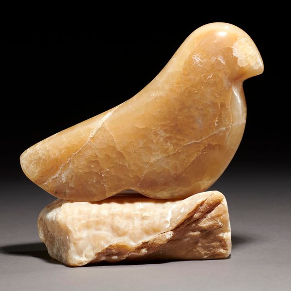 A carved alabaster stylised bird modern 20cm high