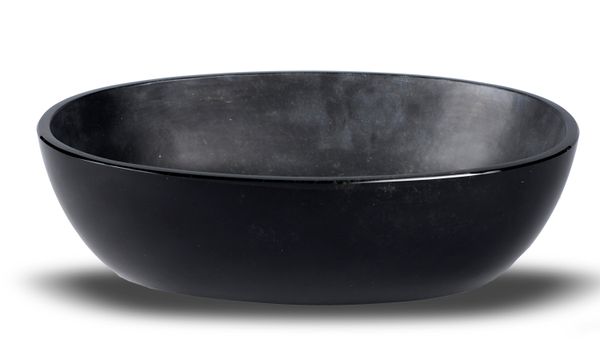 An obsidian bowl Mexico 45cm high by 35cm wide 