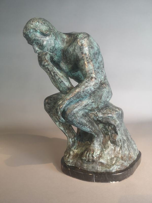After Rodin: A bronze figure of The Thinker modern on marble base 43cm high