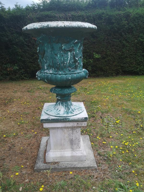 After the Antique: A painted composition stone Borghese urn modern on associated pedestal 140cm high