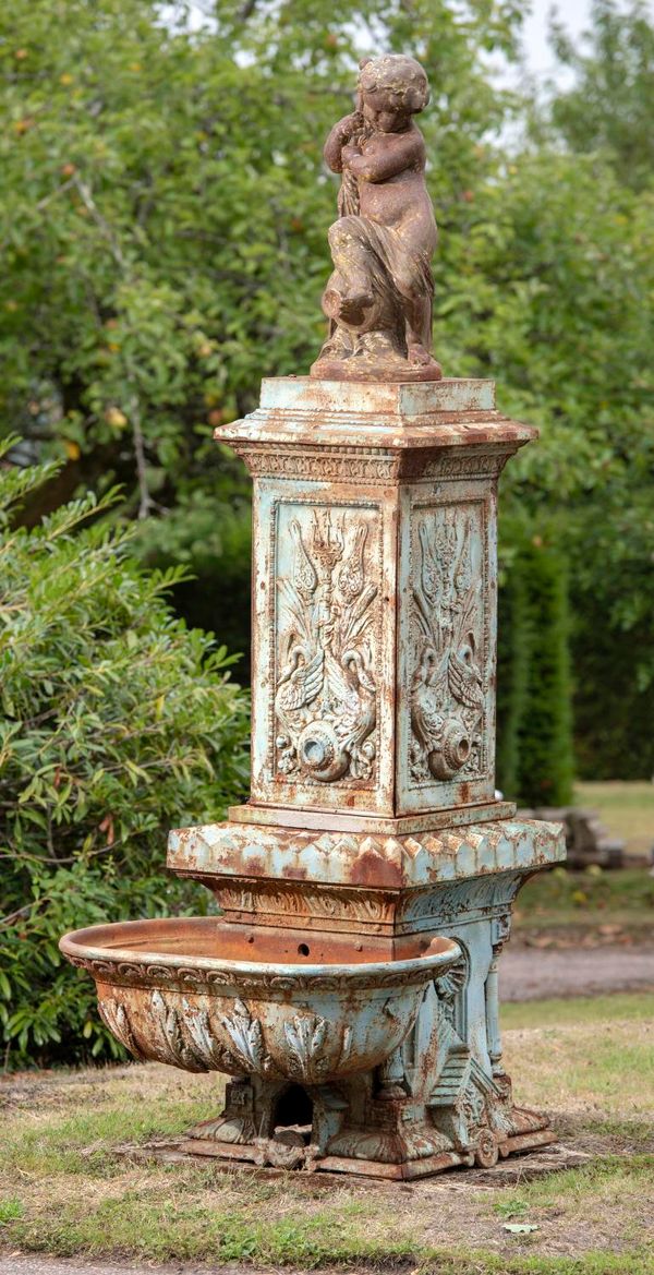 A rare Val d‘Osne foundry cast iron fountain 2nd half 19th century top mounted by a figure of a putti after Mathurin Moreau 248cm high, the bowl 94cm...