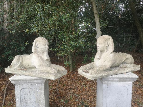 A pair of stone sphinxes 2nd half 20th century  54cm high by 94cm long