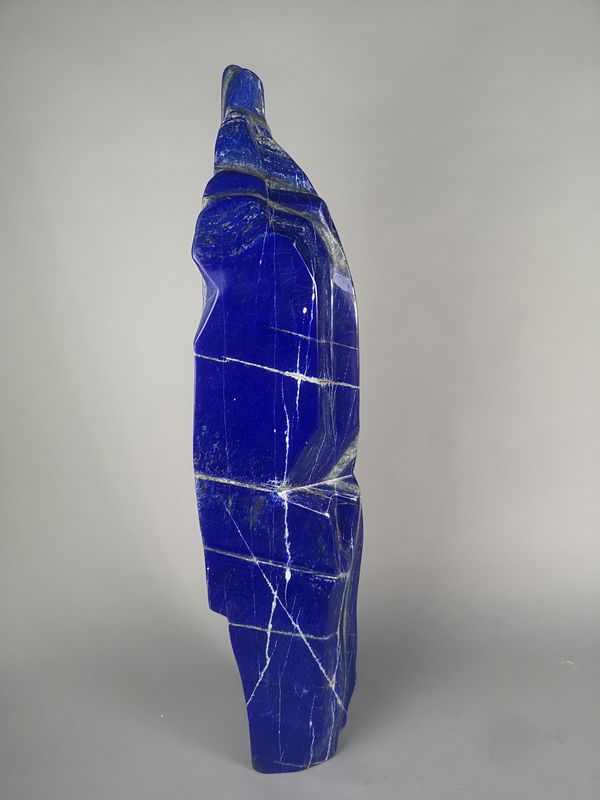 A Lapis lazuli freeform 84cm high by 20cm wide, 33.4kg 