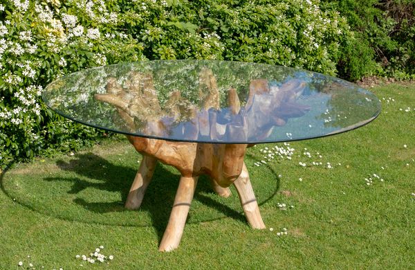 A root wood table with glass top  180cm diameter  