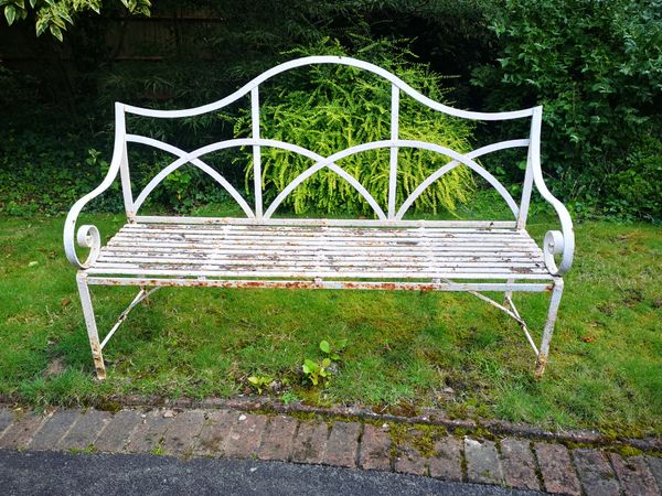 A Regency style wrought iron seat