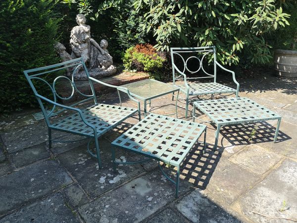 A suite of powder coated aluminium garden furniture