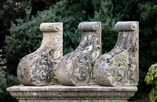 A set of three Georgian carved Portland stone corbels late 18th century 46cm high by 33cm wide