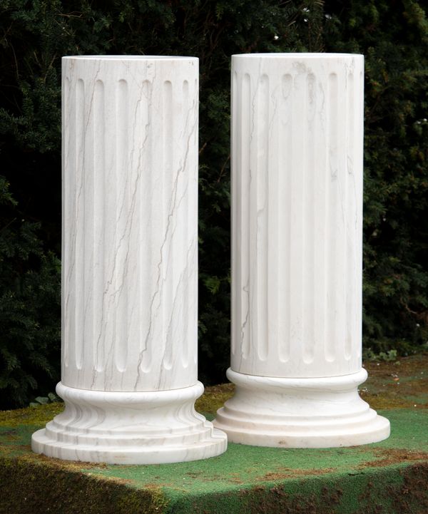 A pair of veined marble white column pedestals modern 100cm high  