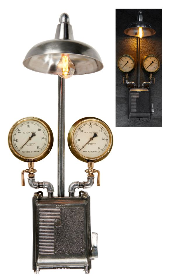A wall light constructed from a 1950‘s Bill Royal Circuit breaker and two salvaged Buchanan Brothers of Glasgow brass water pressure gauges 90cm high...