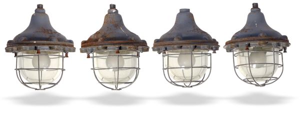 A set of four cast iron industrial light fittings mid 20th century 38cm high 
