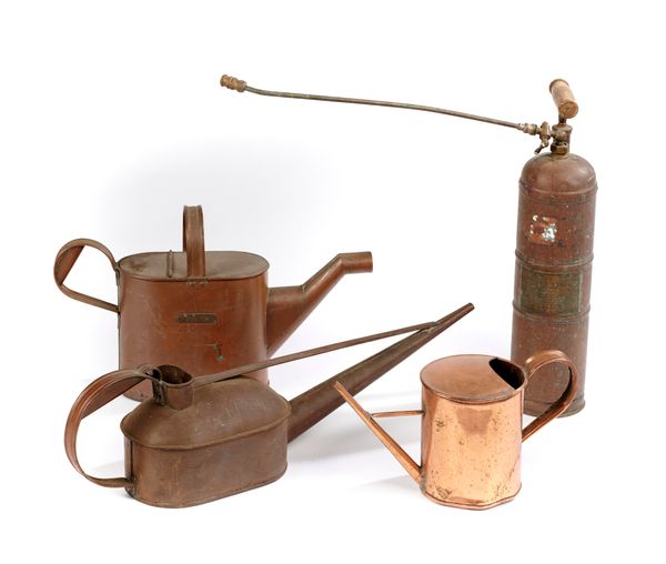 A collection of three copper watering cans 1st half 20th century  the largest 60cm long, together with a French copper syringe pump with makers...