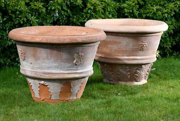 ‡ A pair of tapering cylindrical terracotta planters with maker‘s plaques Italian, 2nd half 20th century 62cm high by 83cm diameter 