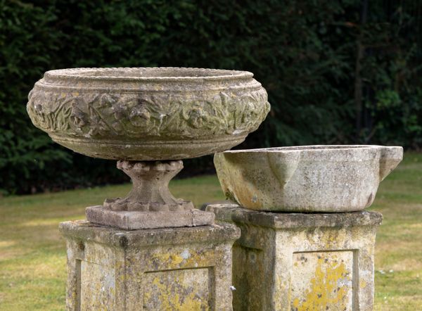 A carved marble water stoop 19th century 50cm wide, together with a later composition stone urn, 66cm diameter 
