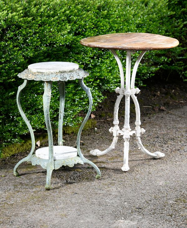 A Victorian cast iron occasional table with mahogany top 55cm diameter, together with another similar smaller plant stand/table, with white marble...